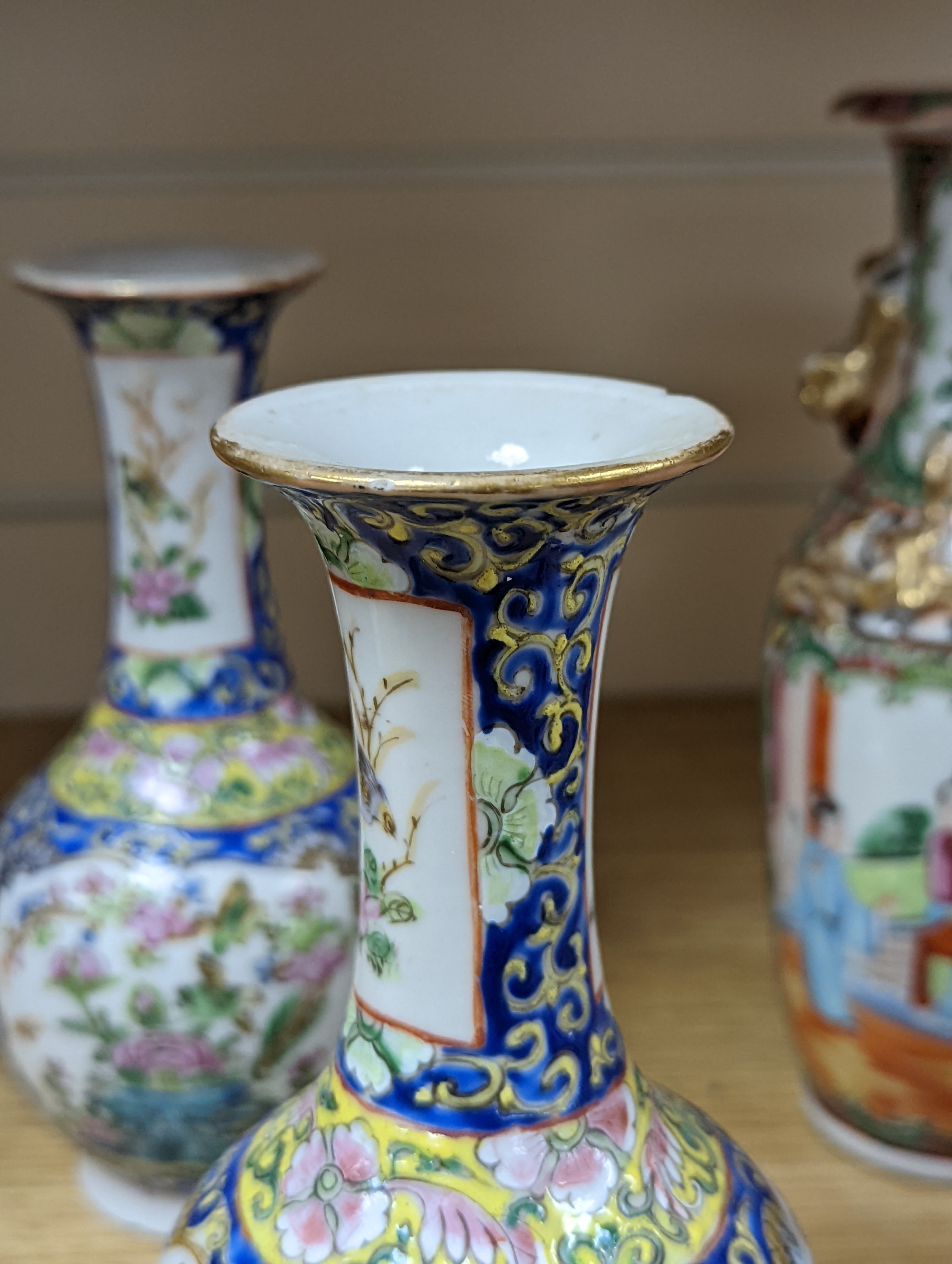 Four 19th century Chinese famille rose vases, 21cm
